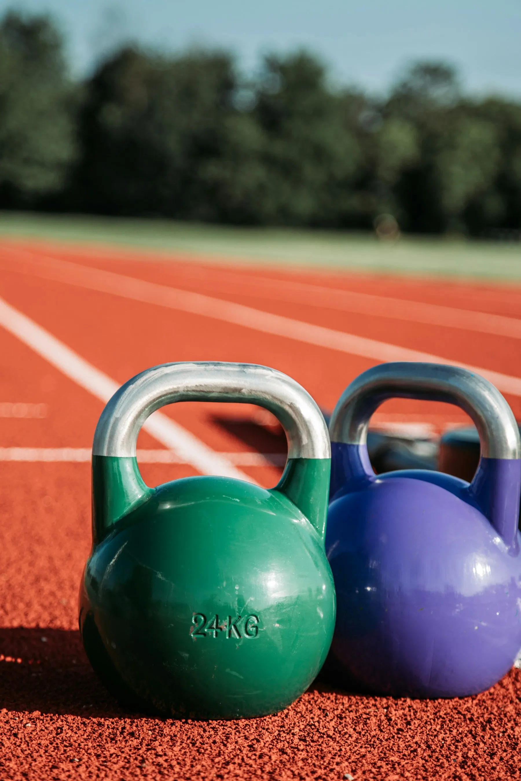 Colourful kettlebells in a row