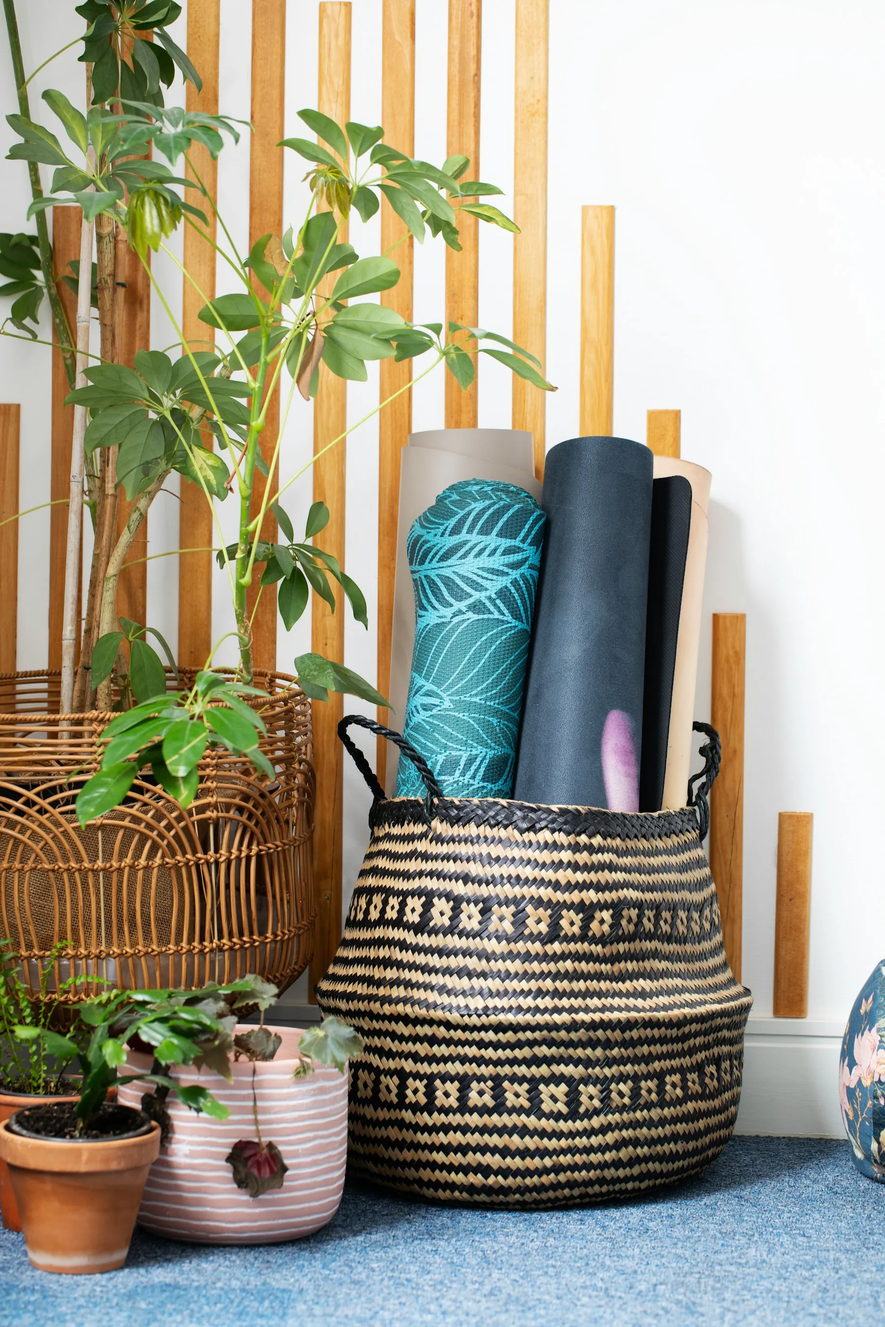 Rolled yoga mats in soft colours