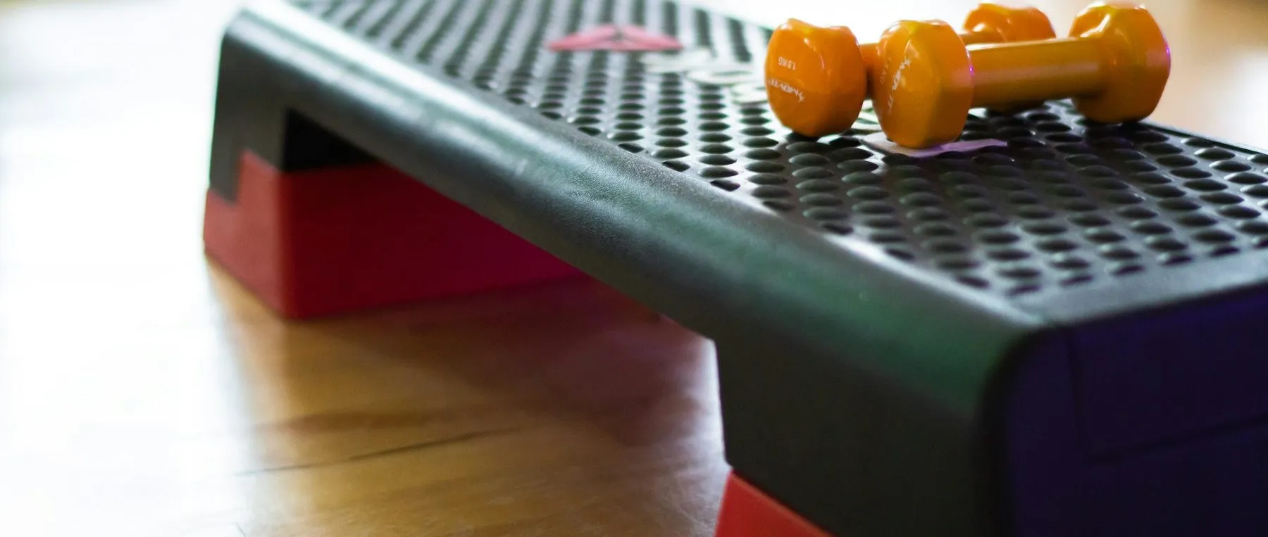Aerobic step platforms on a studio floor